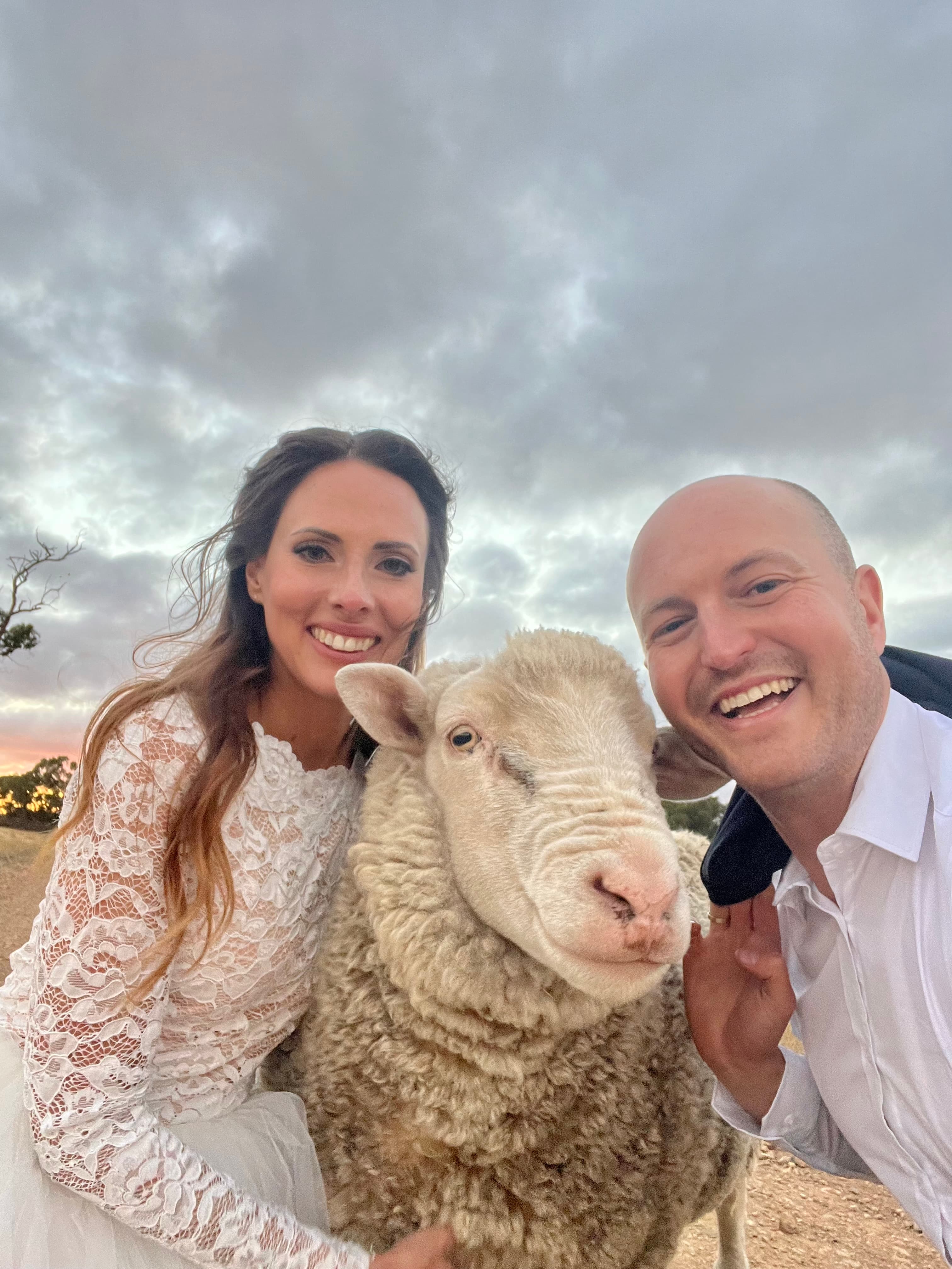 Kyle and Kelly with a sheep